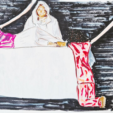 Grupo de mujeres africanas en escena y una de ellas está tumbada